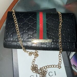 Gucci Black Leather Clutch with Gold Chain and Signature Stripe